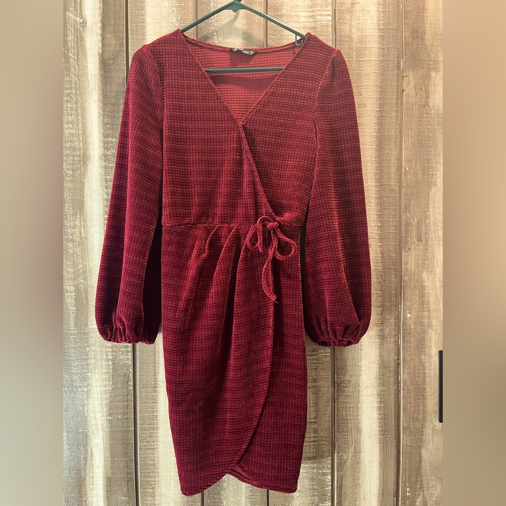 Red long sleeved velvet wrap dress